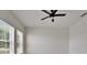 Bedroom featuring ceiling fan, a view to the outside, and natural light at 5205 Brighton Shore Dr, Apollo Beach, FL 33572