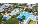 Community pool area featuring pools for swimming and playing, and a unique lighthouse-themed water slide at 5205 Brighton Shore Dr, Apollo Beach, FL 33572