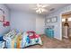 bedroom with colorful decor, carpet flooring, and ample space at 5410 River Sound Ter, Bradenton, FL 34208
