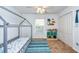 Bright bedroom featuring modern décor, a canopy bed, a window, and a closet at 5410 River Sound Ter, Bradenton, FL 34208