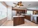 Spacious kitchen with a center island, stainless steel appliances, and plenty of counter space at 5410 River Sound Ter, Bradenton, FL 34208