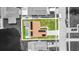 Aerial view of a home with a pool and solar panels at 6370 Elmhurst Dr, Pinellas Park, FL 33782
