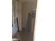 Walk-in closet with ample storage space, shelving and hanging racks at 6403 Elliot Dr, Tampa, FL 33615