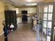 Charming kitchen features stainless steel appliances and ample cabinet space at 6403 Elliot Dr, Tampa, FL 33615