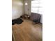 Living room with new hard wood floors, large windows at 6403 Elliot Dr, Tampa, FL 33615