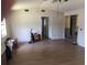 Open living room features great natural light and tile floors at 6403 Elliot Dr, Tampa, FL 33615