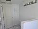 Bright bathroom with light fixture and neutral color palette; potential for customization at 6925-A Avenue Des Palais # 1A, South Pasadena, FL 33707