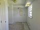 Kitchen undergoing renovation, showing tile floor and window view at 6925-A Avenue Des Palais # 1A, South Pasadena, FL 33707