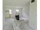Open living room undergoing renovations, with materials ready for installation at 6925-A Avenue Des Palais # 1A, South Pasadena, FL 33707