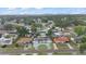Neighborhood aerial view showcasing the single Gathering homes and lush, mature landscaping at 7107 Limestone Ln, Tampa, FL 33619