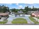 Aerial view of charming home with fenced yard, and landscaping at 7107 Limestone Ln, Tampa, FL 33619