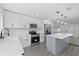 New kitchen with stone countertops, island and stainless steel appliances at 7107 Limestone Ln, Tampa, FL 33619