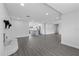 Bright open floor plan with a fireplace, new floors, and lots of natural light at 7107 Limestone Ln, Tampa, FL 33619