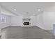 Living room featuring a decorative fireplace and freshly painted walls at 7107 Limestone Ln, Tampa, FL 33619