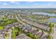 Aerial view of a community nestled among serene lakes and lush landscaping, offering a peaceful residential environment at 7114 Bowspirit Pl, Apollo Beach, FL 33572