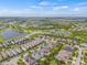 Picturesque aerial shot showcasing a community surrounded by lakes, green spaces, and well-planned residential areas at 7114 Bowspirit Pl, Apollo Beach, FL 33572