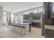 Gourmet kitchen with a large island, modern appliances, and stylish finishes at 7114 Bowspirit Pl, Apollo Beach, FL 33572