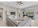 Spacious living room with modern furnishings and an open view to the lanai at 7114 Bowspirit Pl, Apollo Beach, FL 33572
