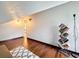 Cozy attic featuring hardwood floors, a bookstand, and natural light, offering a tranquil space at 7206 Timber Ct, Tampa, FL 33625