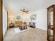Charming living room with neutral tones, ceiling fan, and modern decor at 7206 Timber Ct, Tampa, FL 33625