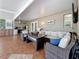 Well-lit sunroom with a comfortable seating area and kitchenette at 7206 Timber Ct, Tampa, FL 33625
