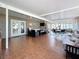 Multi-purpose sunroom with lounge, dining, and fitness areas at 7206 Timber Ct, Tampa, FL 33625