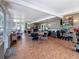 Sunroom with kitchen access and dining area at 7206 Timber Ct, Tampa, FL 33625