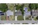 Aerial view of house highlighting the roof, yard, and surrounding neighborhood at 7625 Marechal Ave, Port Richey, FL 34668