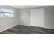 Bedroom featuring a large closet and natural light at 7625 Marechal Ave, Port Richey, FL 34668