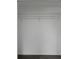 The closet has a metal wire rack at 7625 Marechal Ave, Port Richey, FL 34668