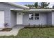Close up shot of a home with a clean, freshly painted exterior at 7625 Marechal Ave, Port Richey, FL 34668