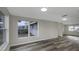 Expansive living area with large windows allowing ample natural light at 7625 Marechal Ave, Port Richey, FL 34668