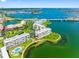 Stunning waterfront condo community with lush landscaping, convenient parking, and picturesque ocean views at 7892 Sailboat Key S Blvd # 408, South Pasadena, FL 33707