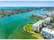 Beautiful waterfront condo community surrounded by water, lush landscaping, and ocean views at 7892 Sailboat Key S Blvd # 408, South Pasadena, FL 33707