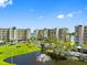 This community showcases lush lawns, mature trees and landscaping with a pond and fountain at 7892 Sailboat Key S Blvd # 408, South Pasadena, FL 33707