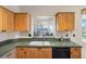 Functional kitchen with updated appliances and cabinetry, and open to adjacent rooms at 7892 Sailboat Key S Blvd # 408, South Pasadena, FL 33707