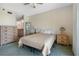 Inviting main bedroom with neutral tones, plush carpet, and ensuite bathroom access at 7892 Sailboat Key S Blvd # 408, South Pasadena, FL 33707