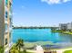 Beautiful waterfront views showcasing the nearby residences and tropical landscape at 7892 Sailboat Key S Blvd # 408, South Pasadena, FL 33707