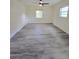 Large, bright bedroom with two windows and wood-look flooring at 8300 Bardmoor Blvd # 110, Seminole, FL 33777