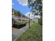 Well-maintained apartment buildings with exterior staircases and manicured green spaces at 8300 Bardmoor Blvd # 110, Seminole, FL 33777