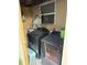 Functional laundry area featuring a washer and dryer, and storage at 8606 N 9Th St, Tampa, FL 33604