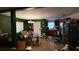 Open living area with wood floors leading to a kitchen, perfect for entertaining and everyday living at 8606 N 9Th St, Tampa, FL 33604
