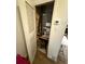 Furnace and water heater in utility closet at 8606 N 9Th St, Tampa, FL 33604
