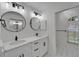 Bathroom featuring a double vanity, modern fixtures, and neutral colors at 916 48Th Street E Dr, Bradenton, FL 34208