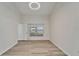 Bedroom with a window offering natural light and wood-look floors at 916 48Th Street E Dr, Bradenton, FL 34208