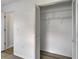 Open closet with shelving and door to the bedroom at 916 48Th Street E Dr, Bradenton, FL 34208