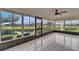 Beautiful screened lanai with tiled floor and a stunning view of the tranquil lake at 916 48Th Street E Dr, Bradenton, FL 34208