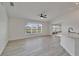 Inviting living room with an expansive window offering serene backyard views and natural light at 916 48Th Street E Dr, Bradenton, FL 34208