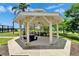 Community picnic pavilion with tables, perfect for gatherings and outdoor dining near waterfront at 916 48Th Street E Dr, Bradenton, FL 34208