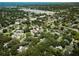 Aerial view of a residential neighborhood at 945 Hamilton Court, Palm Harbor, FL 34683, near a body of water at 945 Hamilton Ct, Palm Harbor, FL 34683